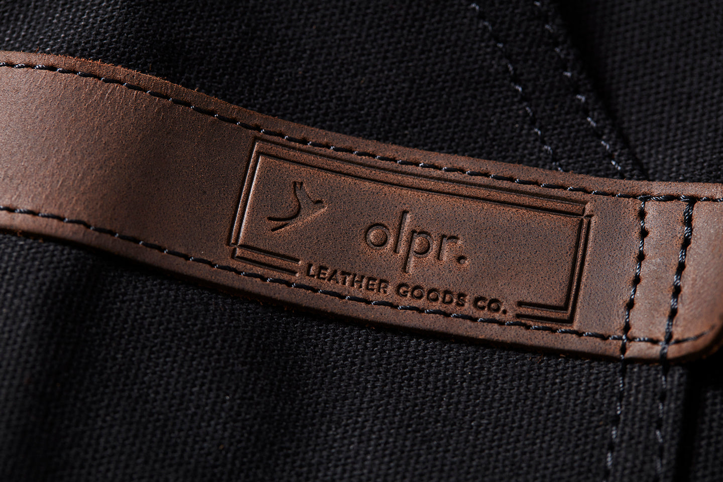Creekstone Farms leather patch apron detail