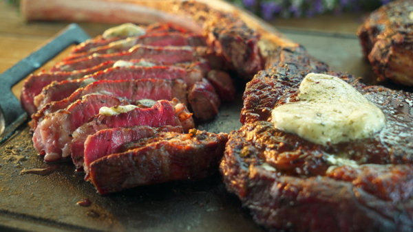 Creekstone Farms Wood-Grilled Beef Tomahawk Steaks with Gorgonzola Butter