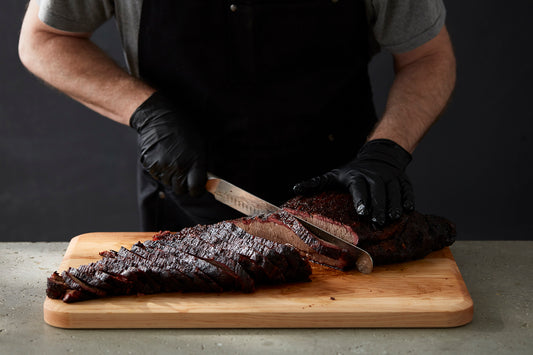 Butcher Slicing Meat